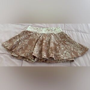 PGM Lex Magical golf floral orange and white ruffle pleated skort, size M casual